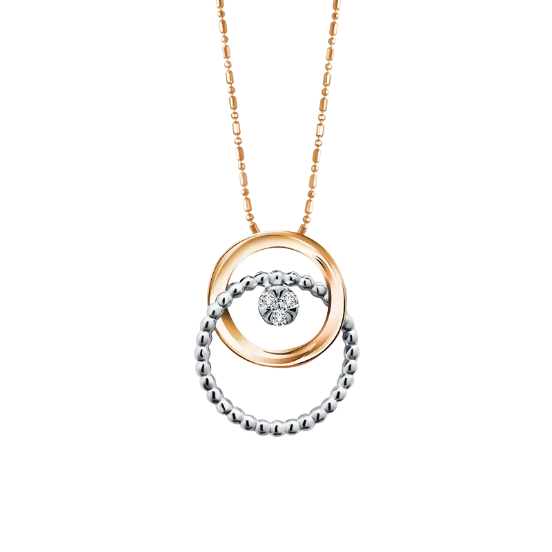 Liontin Moela Modela Elvira memadukan white gold dan rose gold